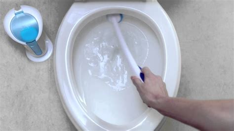 Toilet brush with magic eraser pad